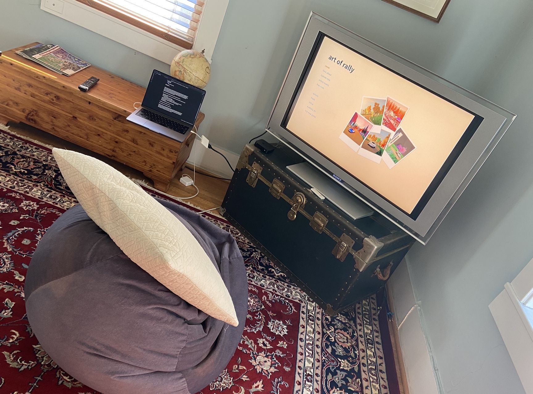 A beanbag and video games on the TV